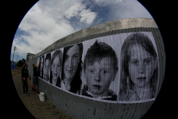 Inside Out Project-New Zealand crew. Pictures of kids from Christchurch-their school is being closed down after the earthquakes. (photo from Inside Out Project facebook page)